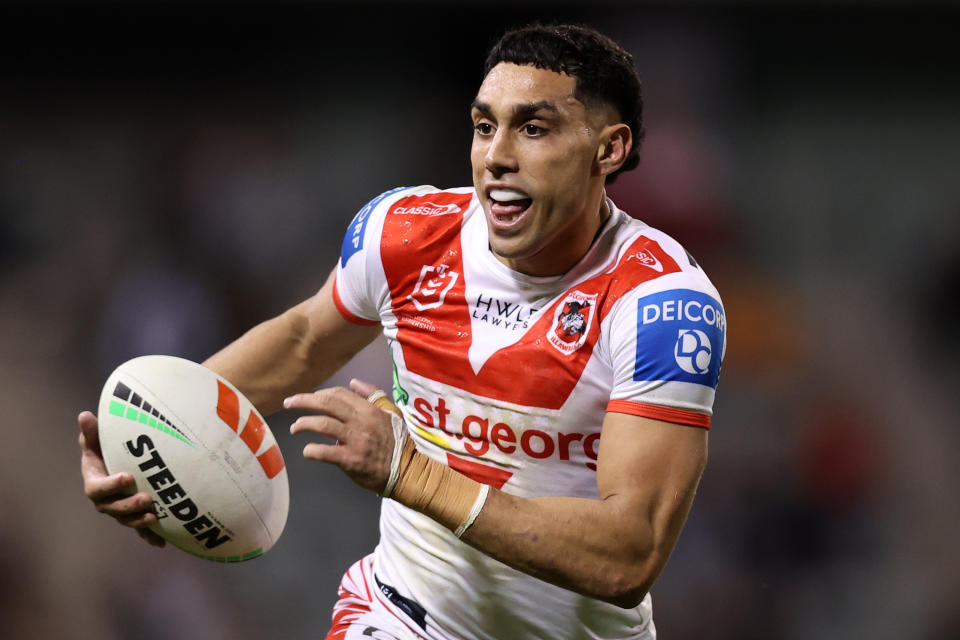 WOLLONGONG, AUSTRALIA - JUNE 07: Tyrell Sloan of the Dragons runs the ball during the round 14 NRL match between St George Illawarra Dragons and Wests Tigers at WIN Stadium on June 07, 2024 in Wollongong, Australia. (Photo by Jason McCawley/Getty Images)