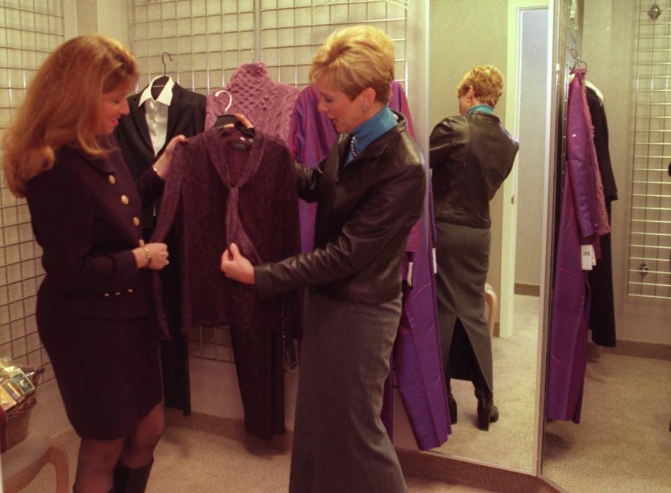 Jan Gardner, personal shopper, right, helps client Cathy Bott with her shopping at Hudson's Lakeside Mall in Sterling Heights on December 13, 2000. With the hectic holidays some people rely on personal shoppers like Gardner to help them make purchases. The Personal Shopping services allows the client to shop in private and not have to search through the clothing racks looking for items. Garder has been a Personal Shopper for 3 years.