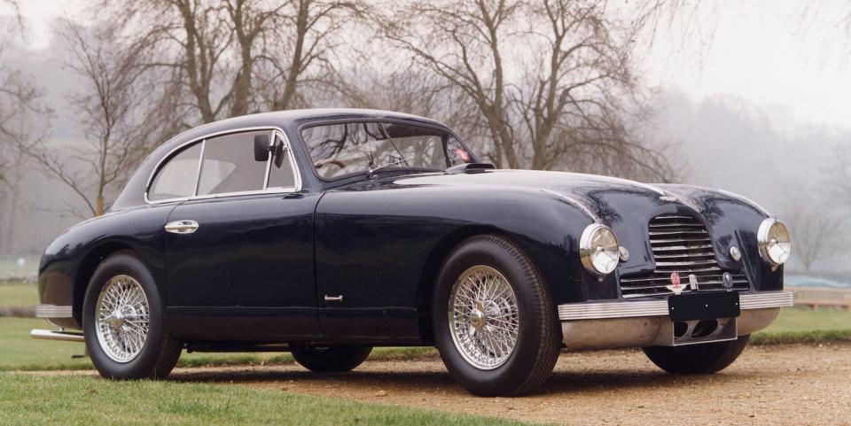 <p>The DB2/4 continued where the DB2 left off. A lengthened chassis allowed Aston to add two (small) rear seats to the DB2, hence the name. The DB2/4 also received an upgraded 2.6-liter straight-six, first used in the DB2 Vantage, later being enlarged to 2.9-liters. </p><p>As was customary at the time, many DB2/4s were made with coachwork bodies, some as two-seat coupes and convertibles. 761 were produced in total.</p>