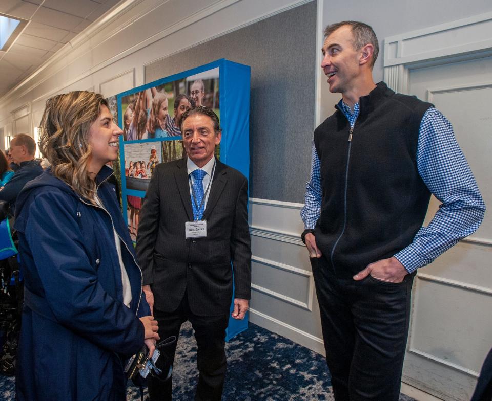 State Reps. Priscila Sousa, D-Framingham, and James Arena-DeRosa, D-Holliston, chat with Boston Bruins legend Zdeno Chara, who is running the 128th Boston Marathon this year for Team Hoyt, March 14, 2024. The trio attended the MetroWest YMCA Marathon Community Breakfast and Annual Campaign Kick-off.