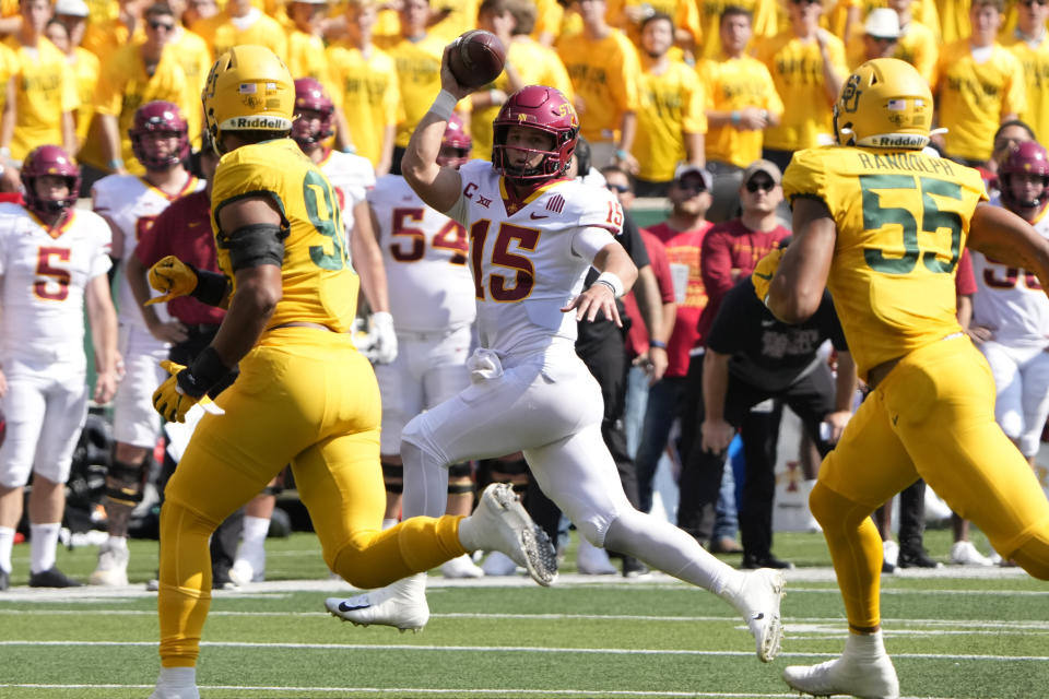 Iowa State quarterback Brock Purdy (15) runs as he looks to pass against Baylor during the first half of an NCAA college football game, Saturday, Sept. 25, 2021, in Waco, Texas. (AP Photo/Jim Cowsert)