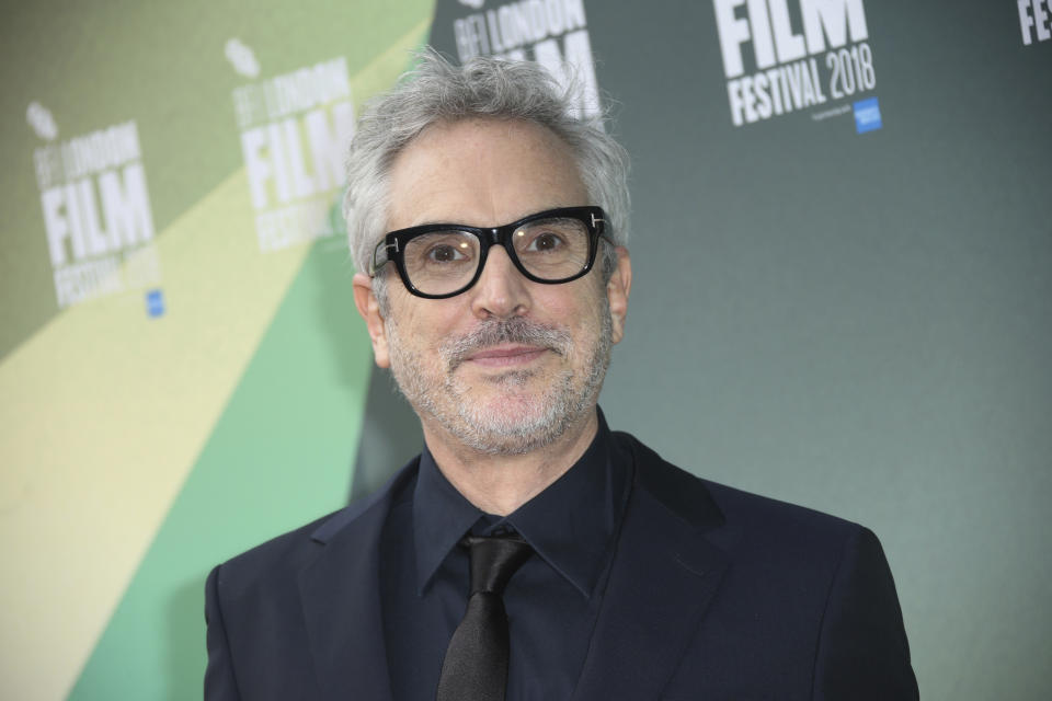 El director mexicano Alfonso Cuarón llega al estreno de su película "Roma· en el Festival de Cine de Londres, el sábado 13 de octubre del 2018. (Foto por Joel C Ryan/Invision/AP)