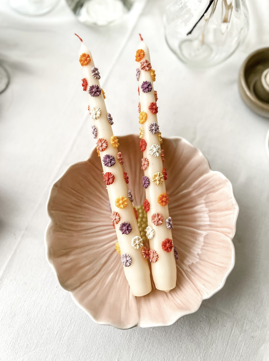 Hand-Decorated Taper Candle Set with painted flowers on tall white candles in pink floral bowl (photo via Etsy)