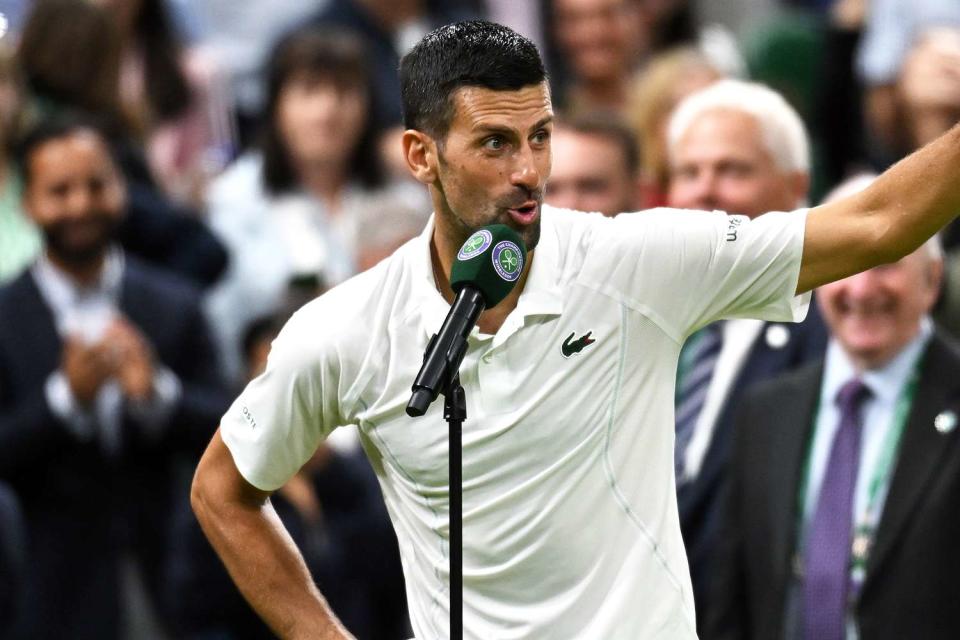 <p>Mike Hewitt/Getty</p> Novak Djokovic of Serbia addresses the crowd on Centre Court on July 08, 2024 in London, England