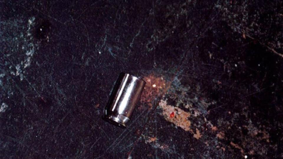 A spent bullet casing on the dining room floor of the Fanion home, where Amy Fanion was found dead with a gunshot to the right side of her head. 