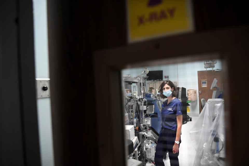 Dr. Jamie Taylor stands in a room that was converted into an area for COVID patients at Los Angeles Surge Hospital