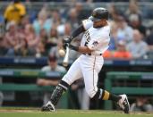 Apr 20, 2019; Pittsburgh, PA, USA; Pittsburgh Pirates left fielder Jason Martin (51) hits a broken bat single against the San Francisco Giants during the third inning at PNC Park. Mandatory Credit: Charles LeClaire-USA TODAY Sports