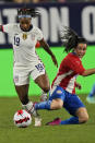 U.S. midfielder Catrina Macario (19) and Paraguay midfielder Fanny Godoy (10) vie for the ball during the first half of an international friendly soccer match Thursday, Sept. 16, 2021, in Cleveland. (AP Photo/Tony Dejak)