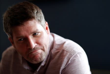 Comedian Mark Nelson poses for a photograph during an interview in Edinburgh