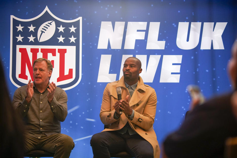NFL Commissioner Roger Goodell, left, and Osi Umenyiora attend the International Series Fan Forum in London, Saturday, Oct. 8, 2022.(AP Photo/Alberto Pezzali)