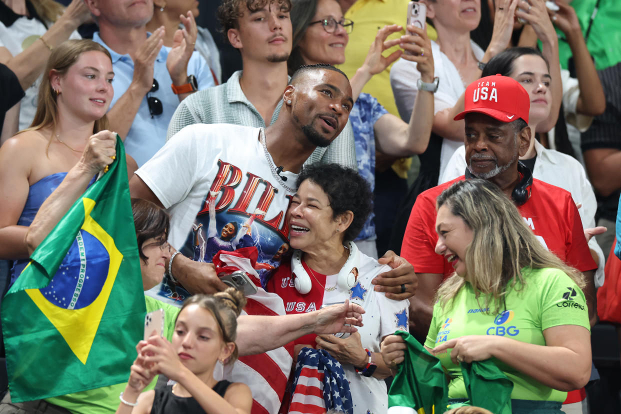 PARIS, FRANCE - JULY 30: (L-R) Jonathan Owens, Nellie Biles and Ronald Biles attend the Artistic Gymnastics Women's Team Final on day four of the Olympic Games Paris 2024 at Bercy Arena on July 30, 2024 in Paris, France. (Photo by Pascal Le Segretain/Getty Images)