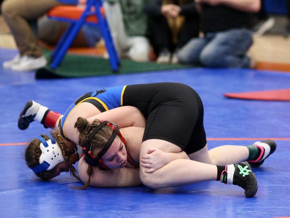 Maysville's Kelsie Bryan wrestles Johnstown's Kortlynn Smith in the 145-pound class during the girls regional tournament at Olentangy Orange on Sunday, March 3, 2024.