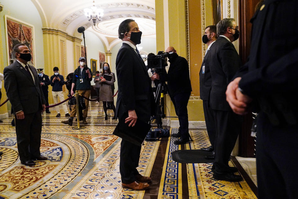 Democratic House impeachment managers stand before entering the Senate Chamber as they deliver to the Senate the article of impeachment alleging incitement of insurrection against former President Donald Trump, in Washington, Monday, Jan. 25, 2021. (Melina Mara/The Washington Post via AP, Pool)