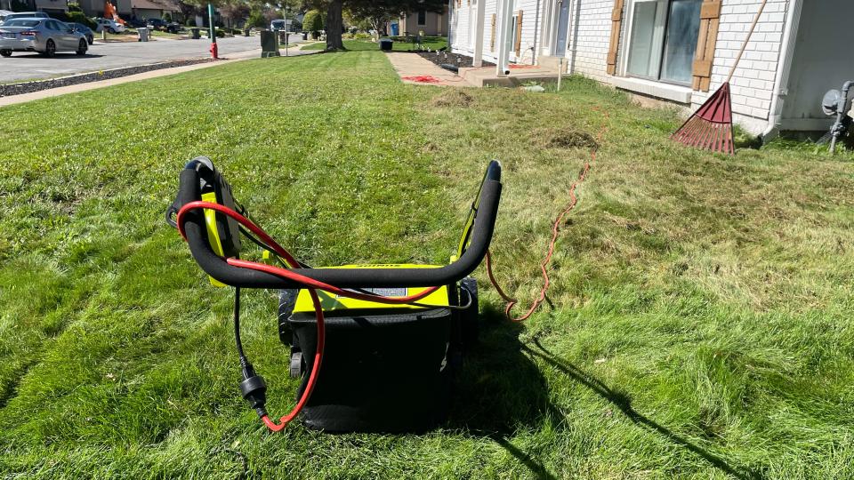using the sun joe dethatcher on a front lawn