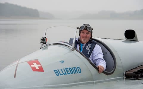 Karl Foulkes-Halbard prepares for his test run of Sir Malcolm Campbell's Bluebird K3 at Bewl Water, in Kent - Credit: Geoff Pugh/The Telegraph