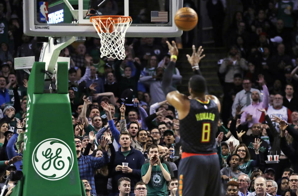 Boston Celtics fans taunt Atlanta Hawks center Dwight Howard (8) on a foul shot during the second half of an NBA basketball game in Boston, Monday, Feb. 27, 2017. The Hawks defeated the Celtics 114-98. (AP Photo/Charles Krupa)