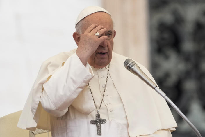 Pope Francis blesses as he arrives for his weekly general audience in St. Peter's Square at The Vatican, Wednesday, May 17, 2023. (AP Photo/Andrew Medichini)