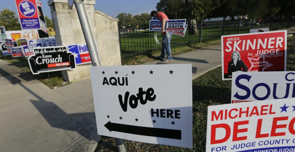 State laws dictate how far away campaign signs and workers need to be from polling places. <a href="https://newsroom.ap.org/detail/EarlyVotingTexas/6034de4ab1b942b894293cd339a07ac2/photo?Query=campaign%20worker%20polling%20place&mediaType=photo&sortBy=&dateRange=Anytime&totalCount=33&currentItemNo=10" rel="nofollow noopener" target="_blank" data-ylk="slk:AP Photo/Eric Gay;elm:context_link;itc:0;sec:content-canvas" class="link ">AP Photo/Eric Gay</a>