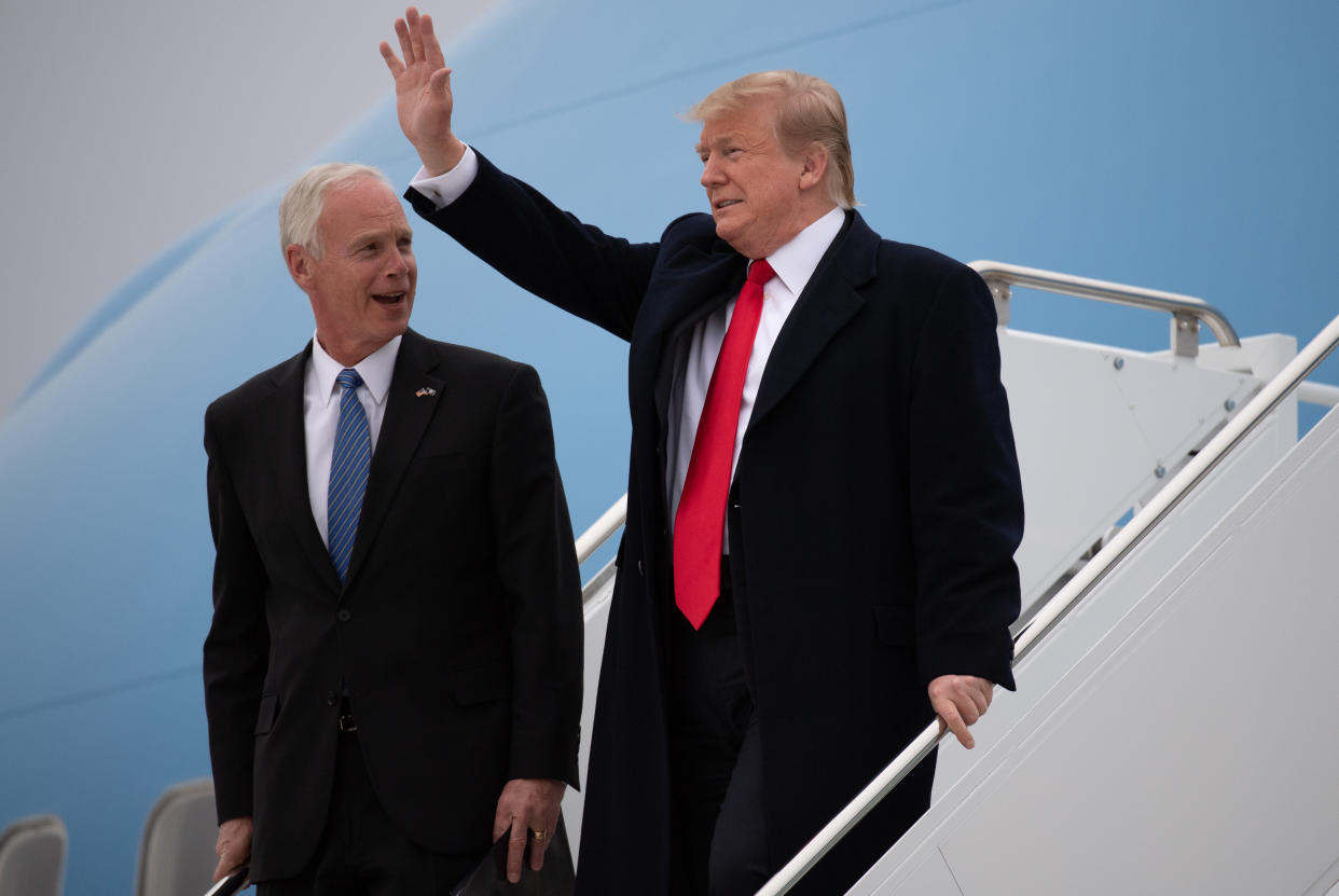 President Donald Trump and Sen. Ron Johnson (R-Wis.) leave Air Force One upon arrival in Green Bay, Wisconsin, on April 27, 2019, before a Trump campaign rally. (Photo: SAUL LOEB/AFP via Getty Images)