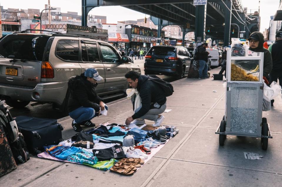 “It’s relentless,” one merchant says of the illegal peddling taking place right outside his store — with items stolen from his shop up for sale at a discount. Stephen Yang