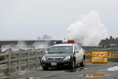 Waves crash at the coast as Typhoon Nepartak approaches in Yilan, Taiwan July 7, 2016. REUTERS/Tyrone Siu