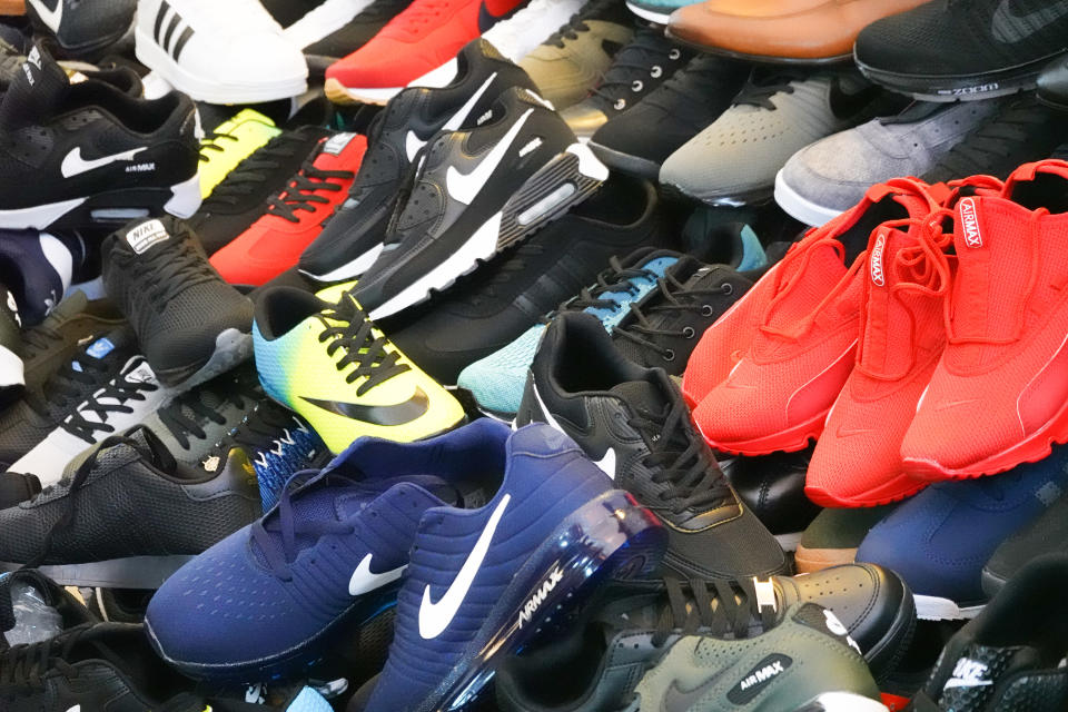 Istanbul, Turkey, September 22., 2018: Bunch of fake brand shoes at the bazaar