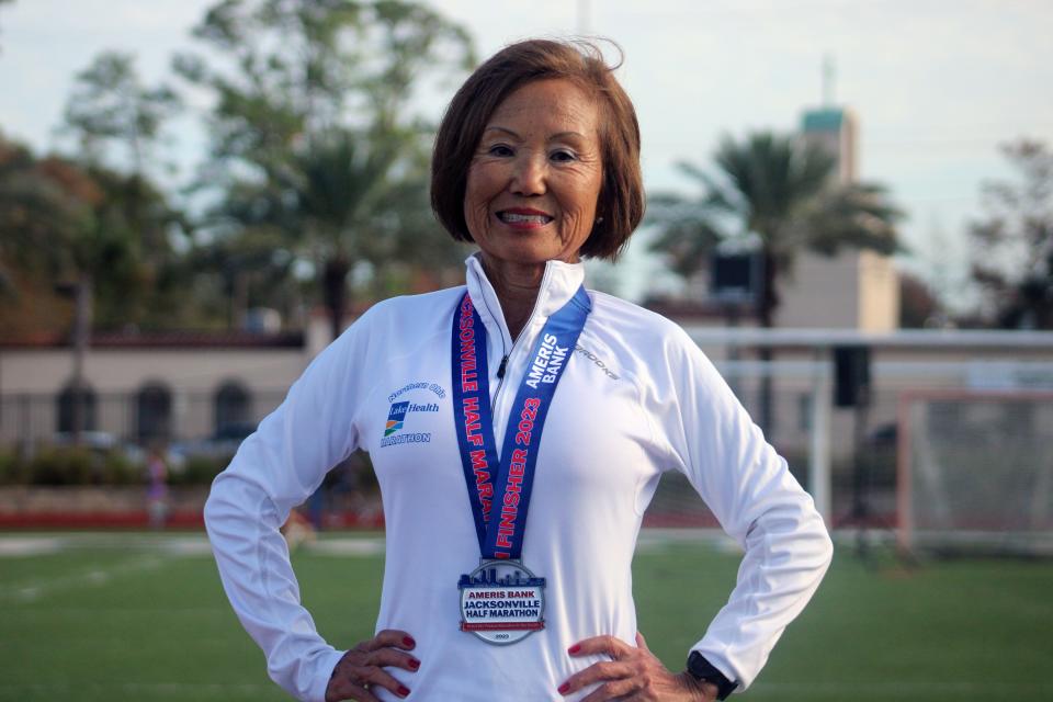 Jeannie Rice, from Bonita Springs, is pictured after running 1:41:53 in the women's half marathon at the Ameris Bank Jacksonville Marathon on December 10, 2023. [Clayton Freeman/Florida Times-Union]