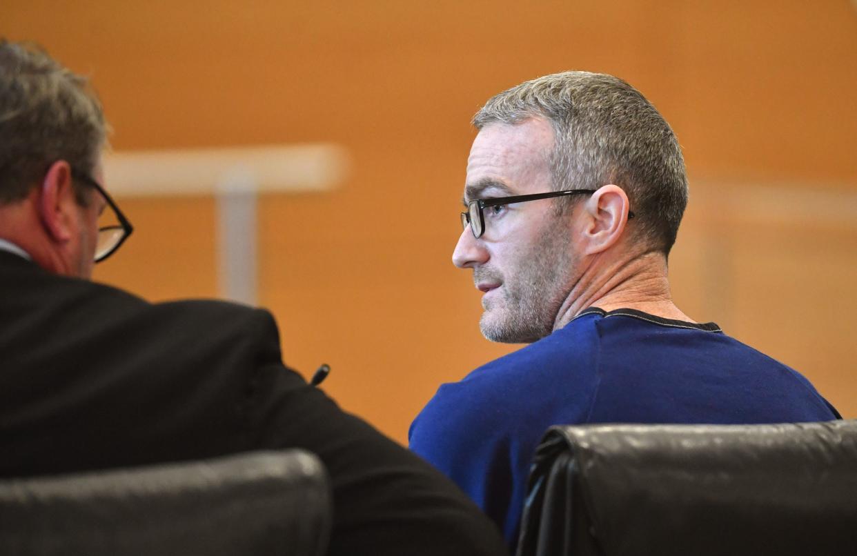 Jabe Carney, right, speaks to his attorney Charles Fletcher during a resentencing hearing Tuesday at the Manatee County Judicial Center. Carney was sentenced in 2008 for DUI manslaughter in the death of his friend, Jason Gibson.