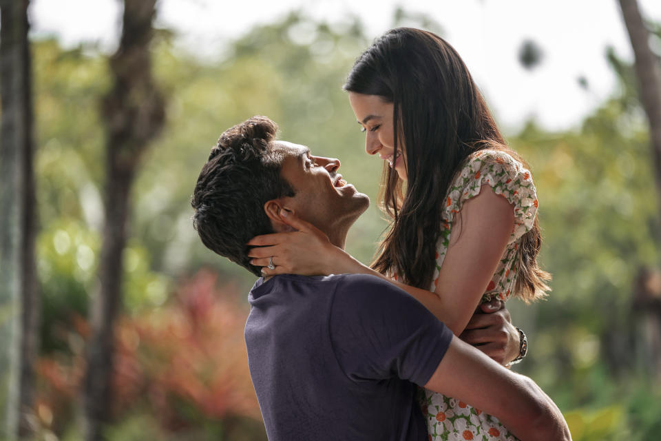 This image released by Netflix shows Sean Teale and Miranda Cosgrove in a scene from "Mother of the Bride." (Sasidis Sasisakulporn/Netflix via AP)