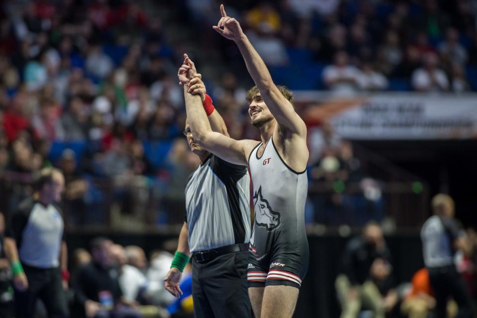 Mar 17, 2023; Tulsa, OK, USA;  Rider wrestler Ethan Laird raises his arms after defeating Illinois wrestler Zac Braunagel (not pictured) in a 197 pound weight class quarterfinal during the NCAA Wrestling Championships at the BOK Center. Mandatory Credit: Brett Rojo-USA TODAY Sports