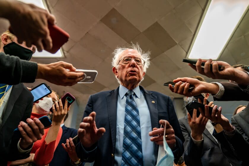 WASHINGTON, DC - NOVEMBER 02: Sen. Bernie Sanders (I-VT) speaks with reporters in the Senate Subway on Tuesday, Nov. 2, 2021 in Washington, DC. (Kent Nishimura / Los Angeles Times)