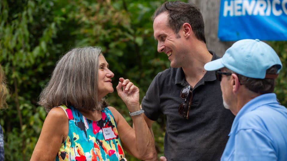 Sue Geller, left, speaks with Democratic state Del. Schuyler VanValkenburg, who's running for Virginia's state Senate District 16, after a rally and canvassing event with Sen. Tim Kaine in Glen Allen, Virginia, on September 9, 2023. - Rebecca Wright/CNN