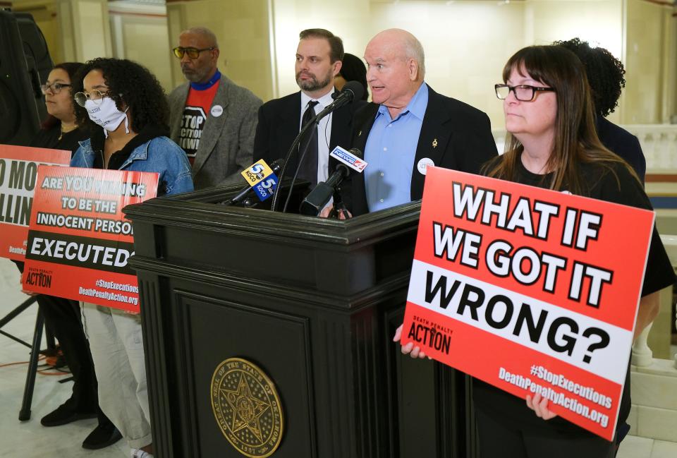 Supporters of Bigler "Bud" Jobe Stouffer II, Stouffer's pastor, the Rev. Howard Potts, speaking, and Stouffer's son, Trey Stouffer, background, deliver thousands of petition signatures asking Gov. Kevin Stitt for clemency for Stouffer.