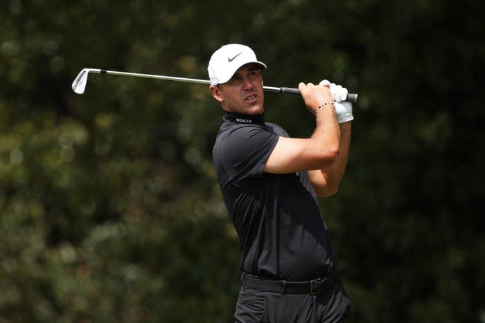 Brooks Koepka swings golf club