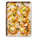 <p>When it comes to easy meals, the sheet pan is your friend — especially when it comes to these cheesy, egg-topped tacos. We dare you not to get yolk on your hands.</p><p>Get the <strong><a href="https://www.goodhousekeeping.com/food-recipes/easy/a30500345/breakfast-taco-recipe/" rel="nofollow noopener" target="_blank" data-ylk="slk:Breakfast Tacos recipe;elm:context_link;itc:0;sec:content-canvas" class="link ">Breakfast Tacos recipe</a></strong>. </p>