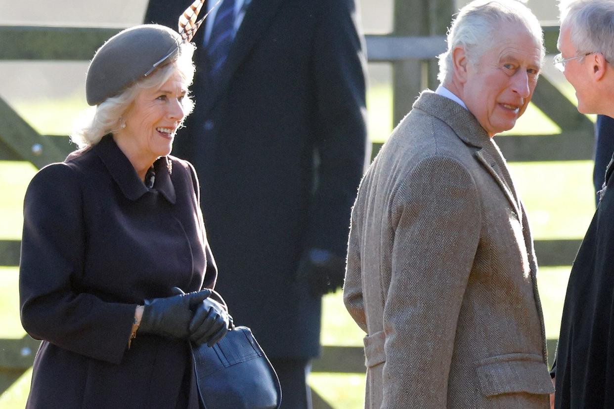 SANDRINGHAM, NORFOLK - JANUARY 01: (EMBARGOED FOR PUBLICATION IN UK NEWSPAPERS UNTIL 24 HOURS AFTER CREATE DATE AND TIME) Camilla, Queen Consort and King Charles III are greeted by The Reverend Canon Dr Paul Williams as they attend the New Year's Day service at the Church of St Mary Magdalene on the Sandringham estate on January 1, 2023 in Sandringham, Norfolk. (Photo by Max Mumby/Indigo/Getty Images)