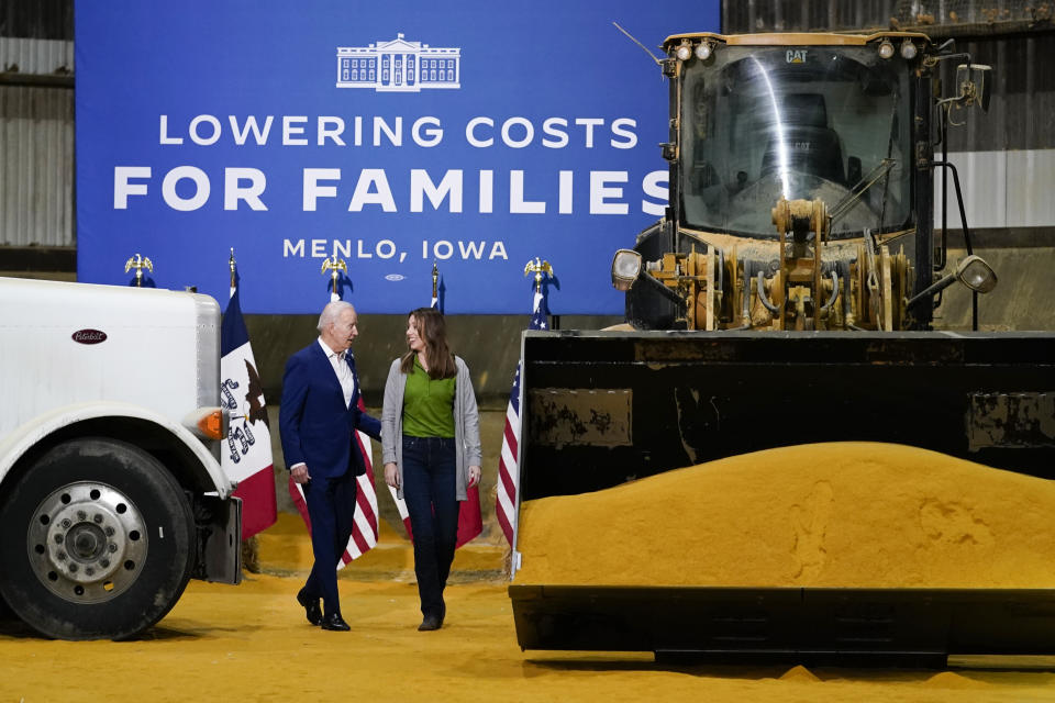President Joe Biden walks with Rachel Connor, a grain merchandiser with POET Bioprocessing, before he speaks at POET Bioprocessing in Menlo, Iowa, Tuesday, April 12, 2022. (AP Photo/Carolyn Kaster)