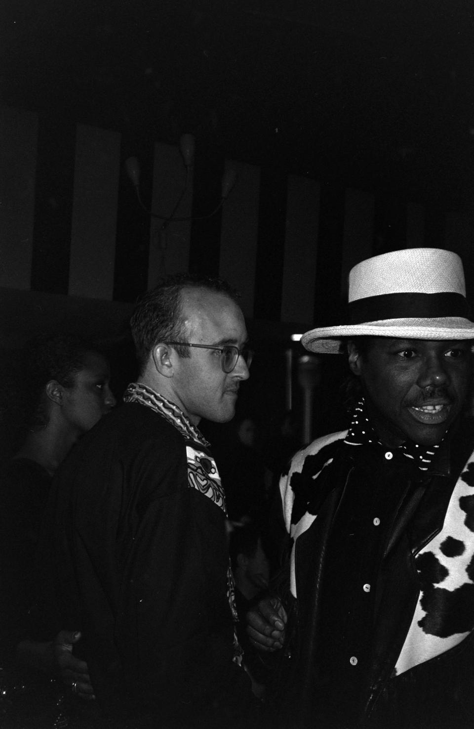 Artist Keith Haring and musician Nile Rodgers attend the “Love Ball” at Roseland Ballroom in New York, 1989. - Credit: WWD,DNR,FN