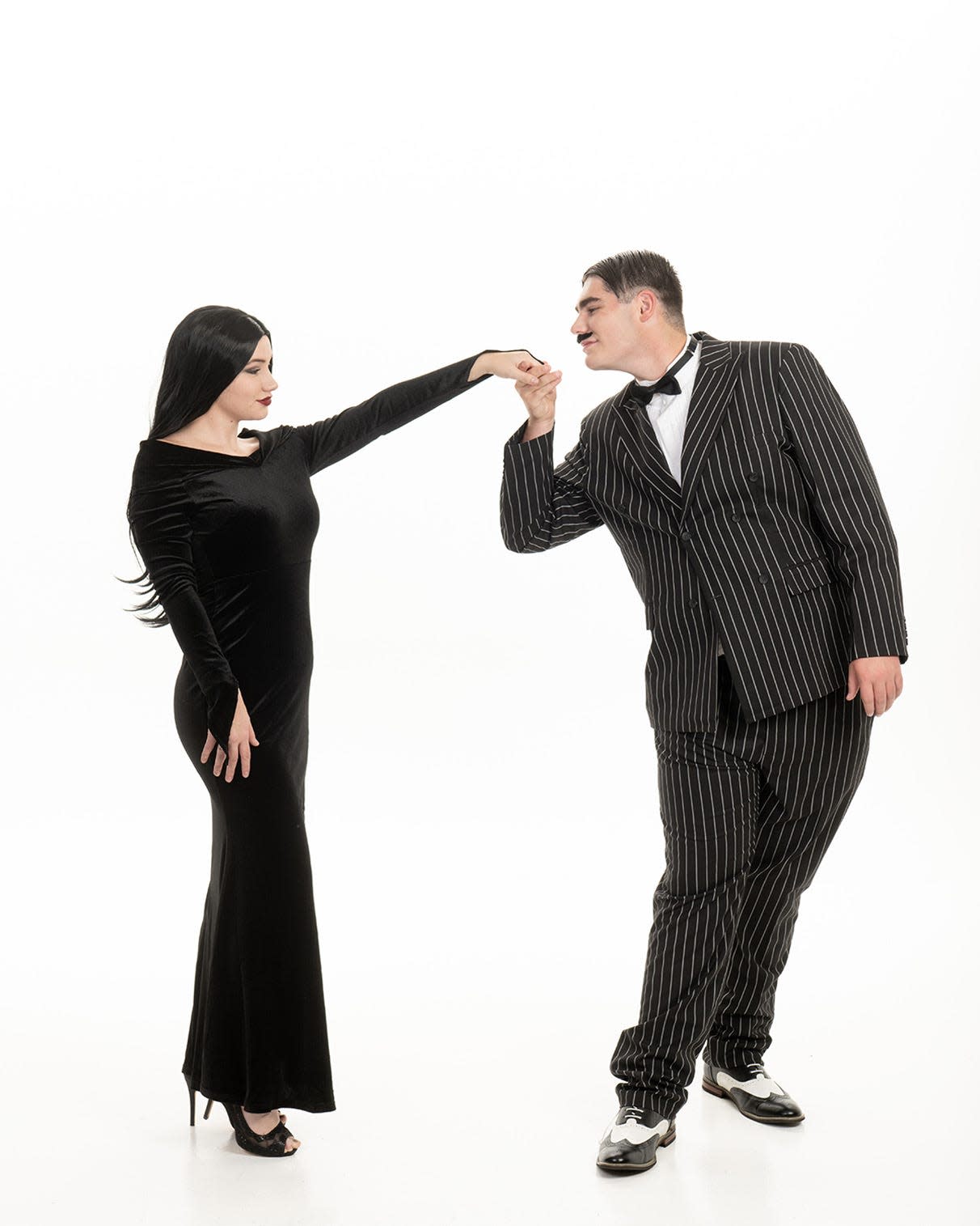 Senior Charity Glista, left, is Morticia Addams, and sophomore Gavin Clay is Gomez Addams in West Branch High School's production of "The Addams Family" this fall.