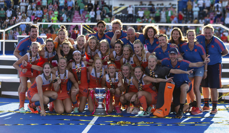 The Netherlands team celebrate winning the Women's Hockey World Cup Final match between the Netherlands and Ireland, at The Lee Valley Hockey and Tennis Centre, in London, Sunday Aug. 5, 2018. (Paul Harding/PA via AP)