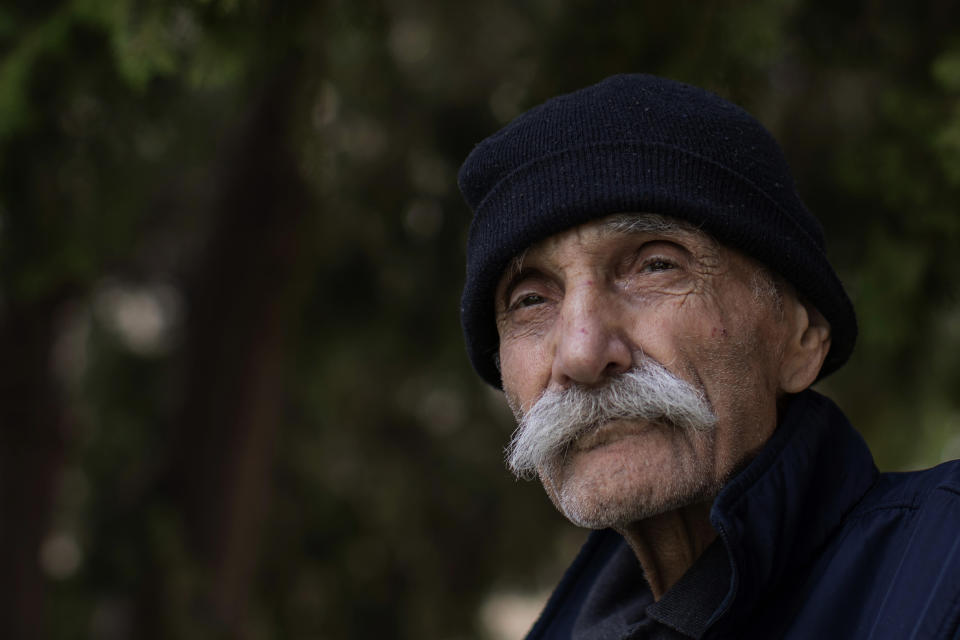Abu Omar, 81, poses for a photograph at the Social Services Medical Association, a rehabilitation hospital and nursing home in the northern city of Tripoli, Lebanon, Thursday, June 10, 2021. With virtually no national welfare system, Lebanon’s elderly are left to fend for themselves amid their country’s economic turmoil. In their prime years, they survived 15 years of civil war that started in 1975 and bouts of instability. Now, in their old age, many have been thrown into poverty by one of the world’s worst financial crises in the past 150 years. (AP Photo/Hassan Ammar)