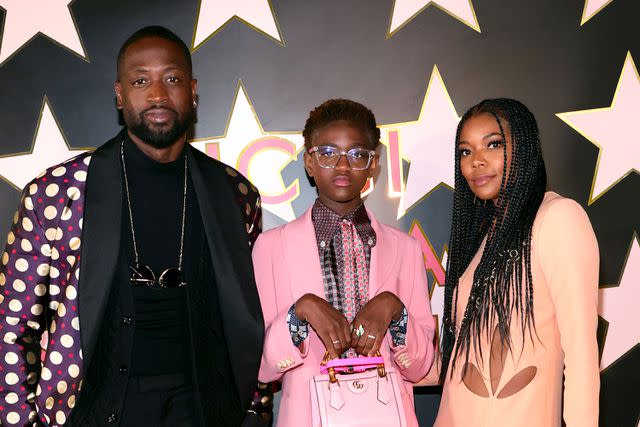 <p>Rich Fury/Getty</p> Dwyane Wade, Zaya Wade and Gabrielle Union