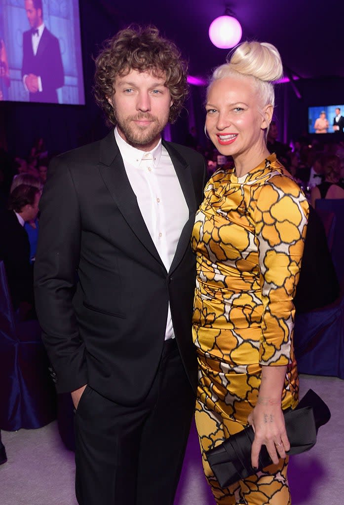 Filmmaker Erik Anders Lang (L) and singer-songwriter Sia attend the 23rd Annual Elton John AIDS Foundation Academy Awards viewing party with Chopard on February 22, 2015 in Los Angeles, California.