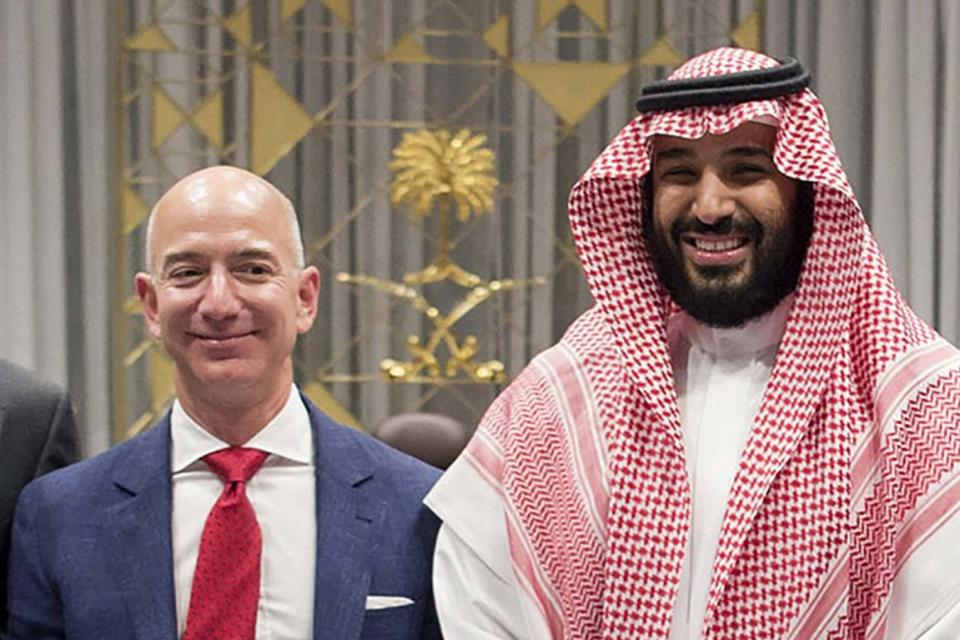 Saudi Arabia's Crown Prince Mohammed bin Salman (R) posing for a picture with Amazon chief, Jeff Bezos: Saudi Royal Palace/AFP via Getty