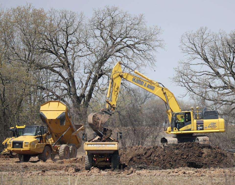 Construction crews work on the site of a new Camping World store being built at 3855 S. Washburn St. in Oshkosh. The store and RV sales center is expected to be completed in December.