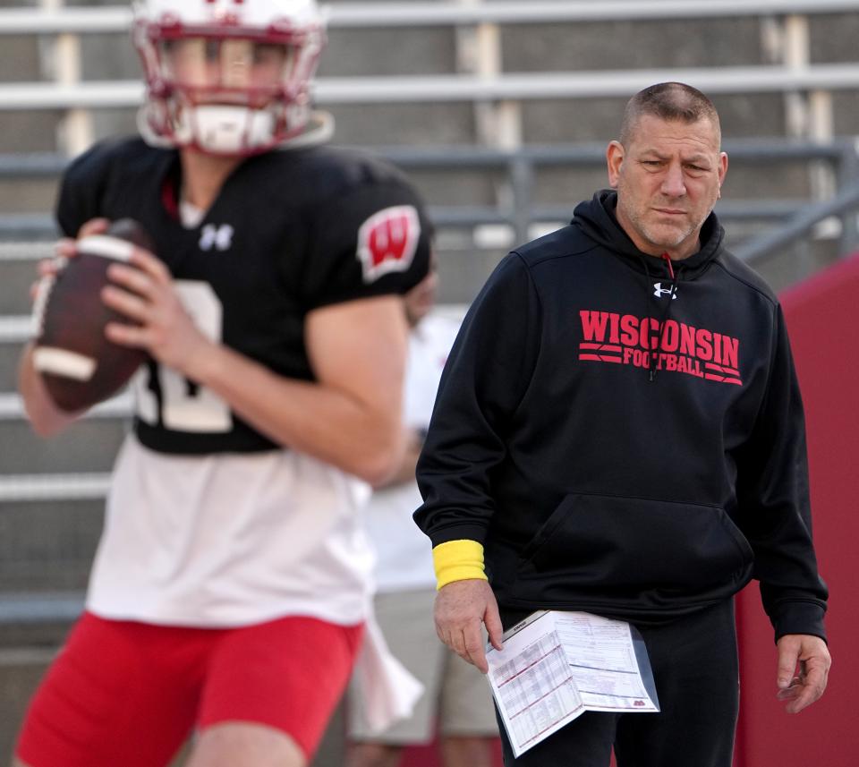 Wisconsin offensive coordinator and quarterbacks coach Phil Longo watches quarterback Marshall Howe (12) during practice Tuesday, April 11, 2023 at Camp Randall Stadium in Madison, Wis.Mark Hoffman/Milwaukee Journal Sentinel