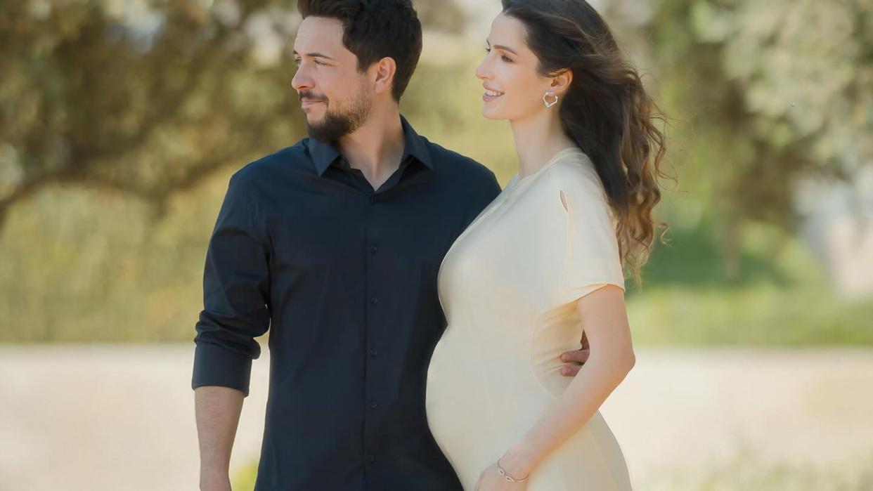 Princess Rajwa and Crown Prince Hussein of Jordan posing in the sun