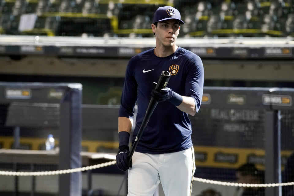 FILE - In this Monday, July 6, 2020, file photo, Milwaukee Brewers' Christian Yelich waits to hit during baseball practice at Miller Park in Milwaukee. (AP Photo/Morry Gash, File)