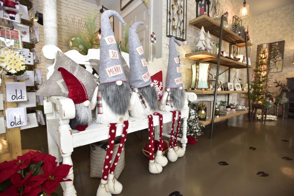 Crafted holiday decorations at the home décor boutique the Lazy Llama located on 214 Broadway St., in Marine City on Monday, Dec. 5, 2022. The year has been dominated by headlines about rising costs of inflation and concerns about a future economic recession.