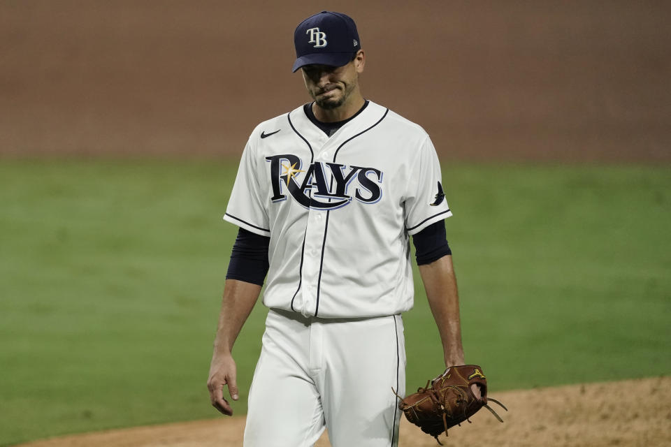 Tampa Bay Rays starting pitcher Charlie Morton walks off the mound after being relieved during the sixth inning in Game 7 of a baseball American League Championship Series against the Houston Astros, Saturday, Oct. 17, 2020, in San Diego. (AP Photo/Ashley Landis)